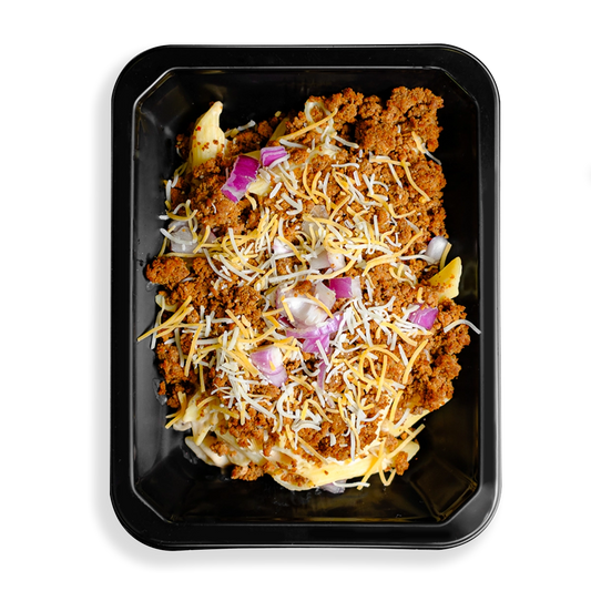 Cheese and red onion are sprinkled in perfect proportion over lean ground turkey and penne pasta and is seasoned to perfection. The portioning looks to be the perfect sized healthy prepared meal for lunch or for dinner.