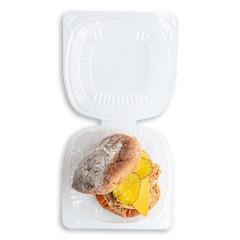 wow just an absolutely delicious looking piece of beard sits on top of this BBQ sandwich obscuring its contents.  all i see are two pickles and a wedge of cheese sticking out from under the bread. this food looks amazing and if its healthy than this is an absolute game changer for those seeking healthy prepared meals.