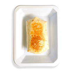 In this white container is a perfectly folded looking burrito which inside has  scrambled eggs and lean ground turkey.  This is a burrito in a to-go container for delivery or instore pickup for someone who is being mindful of the calories they consume but does not want eat something without flavor.  A healthy prepared meal would be a good way to describe the way this burrito sits in this container.  
