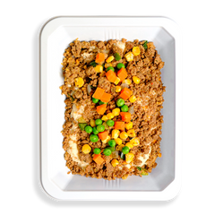 This hearty to-go meal features lean ground bison, red potatoes, and a colorful mix of vegetables like peas, carrots, cauliflower, and corn, all tossed in a savory parmesan and garlic cream sauce. It’s a wholesome twist on the classic British comfort dish, perfect for busy individuals who prefer healthy, ready-made meals—whether delivered or picked up on the go.