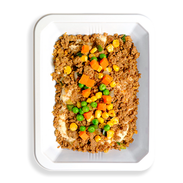 This hearty to-go meal features lean ground bison, red potatoes, and a colorful mix of vegetables like peas, carrots, cauliflower, and corn, all tossed in a savory parmesan and garlic cream sauce. It’s a wholesome twist on the classic British comfort dish, perfect for busy individuals who prefer healthy, ready-made meals—whether delivered or picked up on the go.