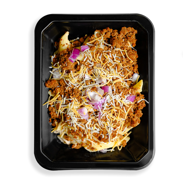 Cheese and red onion are sprinkled in perfect proportion over lean ground turkey and penne pasta and is seasoned to perfection. The portioning looks to be the perfect sized healthy prepared meal for lunch or for dinner.