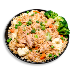 A vibrant plate filled with shredded, seasoned chicken thigh resting over a bed of fluffy brown fried rice, speckled with tender green peas, diced carrots, and fluffy scrambled egg whites. Bright green steamed broccoli crowns the side of the dish, while chopped green onions are scattered on top, adding freshness to this flavorful, health food favorite. A delicious, lower-carb spin on a takeout classic.