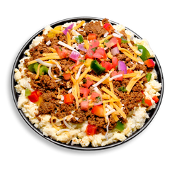 A colorful and hearty health food plate featuring a fluffy egg scramble base topped with seasoned lean ground turkey, sweet fire-roasted corn, and a vibrant mix of chopped red and green bell peppers. Finished with shredded cheddar cheese, diced tomatoes, red onions, jalapeños, and a sprinkle of cilantro, this healthy meal prep dish is a bold and nutritious take on a classic breakfast scramble.