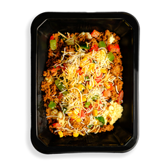 A colorful mound of lean turkey, eggs, corn, and peppers topped with melted cheddar and fresh tomatoes, perfect for health-focused eaters on the go. This food sits inside a black togo container and is clearly ready to be delivered and enjoyed.