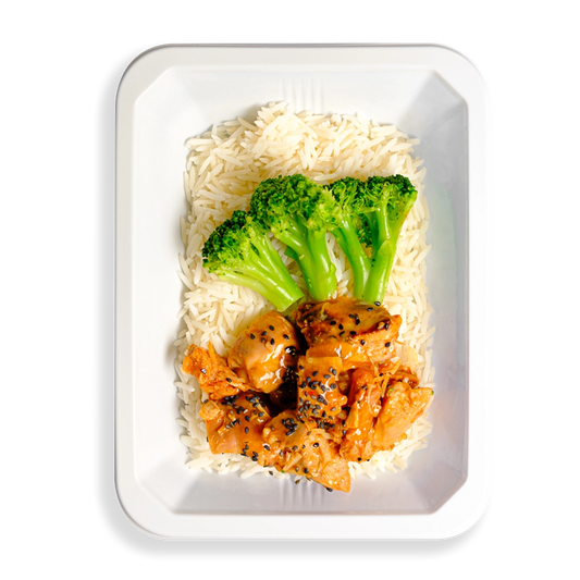 This might be the freshest take on Chinese food I’ve ever seen—what really sets it apart is how clean and wholesome it looks. Tender orange-glazed chicken and crisp broccoli stalks are served over a fluffy bed of white rice, all neatly packed into a white to-go container. Everything appears well-seasoned and thoughtfully prepared, making it an ideal healthy meal option for those who crave bold flavor without sacrificing nutrition.