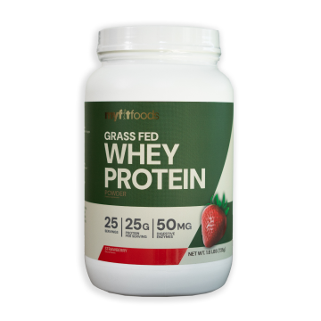 Large container of MyFitFoods 100% Grass Fed Whey Protein in strawberry flavor, featuring a fresh strawberry graphic on the front label.