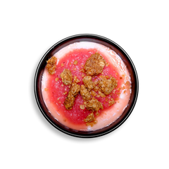 Top-down view of a wholesome and visually striking breakfast bowl filled with non-fat Greek yogurt, generously topped with a thick blend of strawberry and pineapple purée. Crunchy whole grain granola clusters are sprinkled across the center, adding texture to this light yet satisfying healthy meal prep option ideal for a quick, energizing start to the day.