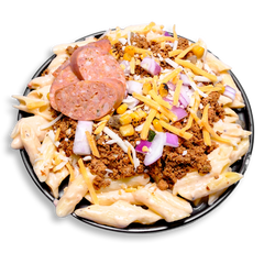 This elevated healthy meal prep dish showcases a generous portion of creamy mac and cheese made with real cheddar and parmesan, crowned with a spicy twist. Lean ground turkey and natural bison form the savory base, while thick-cut jalapeño cheddar sausage slices rest on top. Grilled corn, poblano peppers, and diced red onion add color and crunch, finishing this flavorful, protein-packed health food plate with southwestern flair.