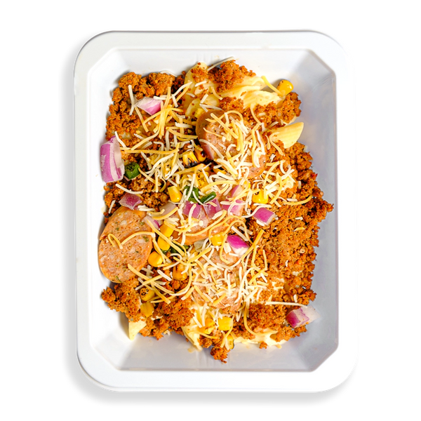 This to-go container is packed with a flavorful mix of textures and vibrant colors. A hearty blend of lean ground turkey, natural pork, and bison sits alongside pasta and a medley of mixed vegetables, including fire-roasted corn and poblano peppers. Topped with a sprinkle of shredded yellow and white cheese, this satisfying, protein-rich meal is perfect for anyone looking to eat well on the go without compromising on taste.