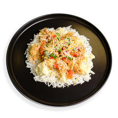 This high-protein breakfast scramble concept is plated with precision: long-grain white rice forms the base, while juicy pulled chicken thigh and fluffy egg whites with yolks are scattered throughout. The dish is finished with a bold pico de gallo and a delicate mix of cheddar and pepper jack cheeses, making it a standout option for clean eating and healthy meal prep enthusiasts.